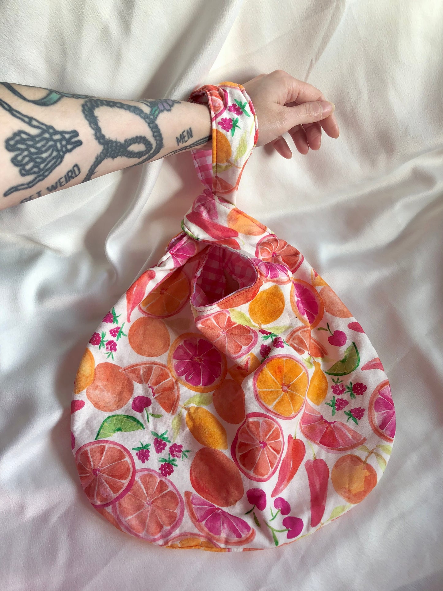 Bright fruit Reversible Knot Handbag